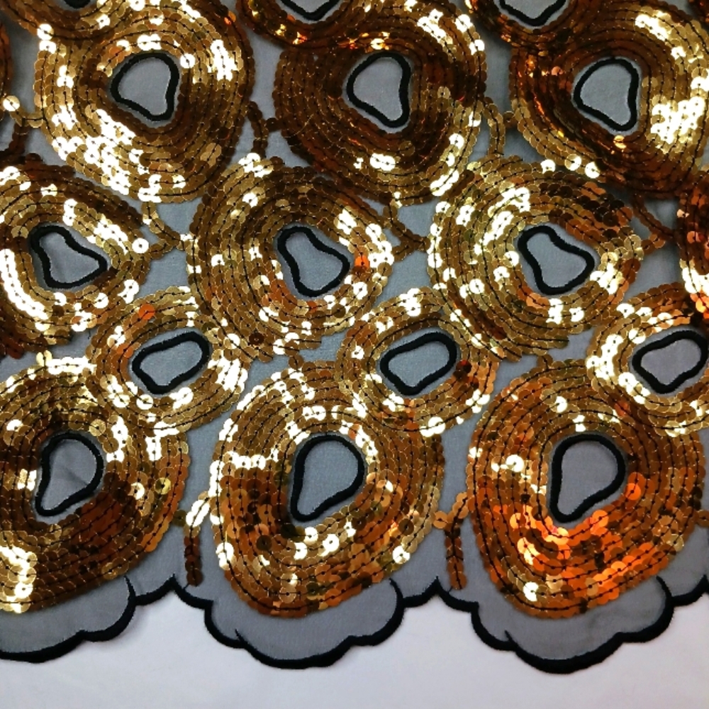 Scalloped Edge Gold Sequin Circles On Black Organza Fabric.